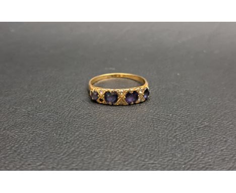GRADUATED SAPPHIRE AND DIAMOND RINGthe two larger central sapphires approximately 0.3cts each and two smaller flanking sapphi