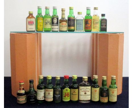 A selection of 21 miniature Scotch Whiskies incl:- Vat 69 and Stuart Royal