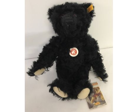 A Steiff Teddy Bear 'Classic Black Titanic'. Yellow label. EAN 3509. Black mohair. With labels attached. In excellent conditi