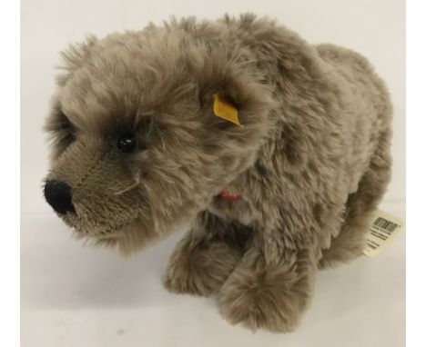 A Steiff 'Grizzly Bear' soft toy. Yellow label. EAN 69345. Light brown mohair. With labels attached. Unboxed. In excellent co