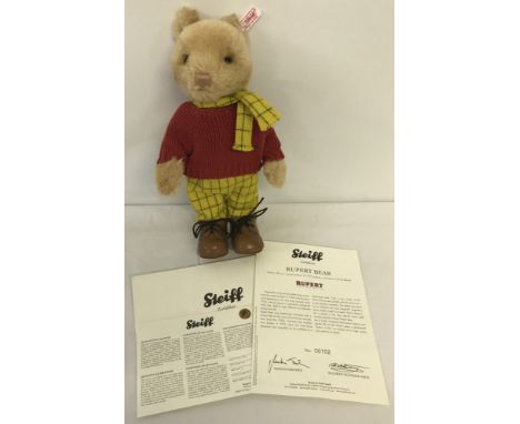 A 2007 Limited Edition Steiff Rupert Bear Teddy with unusual brown coloured alpaca fur. Number 702/1973. 1973 pieces were mad