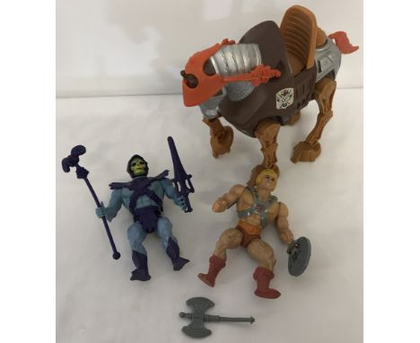 3 vintage Mattel 1980's Masters of the Universe action figures and weapons. Comprising: He-Man with shield, body armour and a