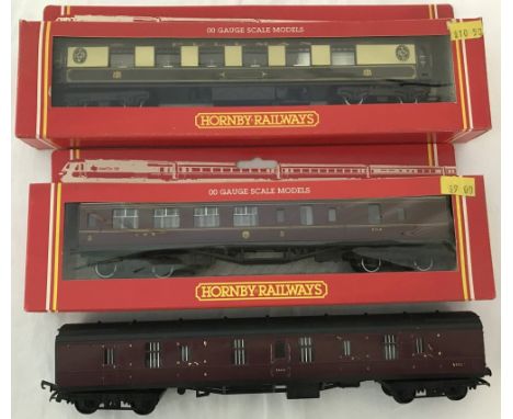 2 boxed  Hornby 00 gauge carriages. Together with a Tri-ang unboxed train carriage. Comprising R475 LMS brake 3rd coach ( cri