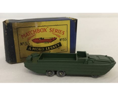 A boxed Matchbox #55 D.U.K.W. Model mint condition, box fair - staining. Grey plastic wheel version. 