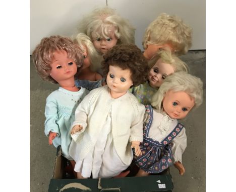 7 vintage larger vinyl dolls.  