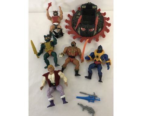 A box of assorted 1980's Mattel Masters of the Universe action figures and playset. To include: Roton Assault Vehicle, Mer-ma