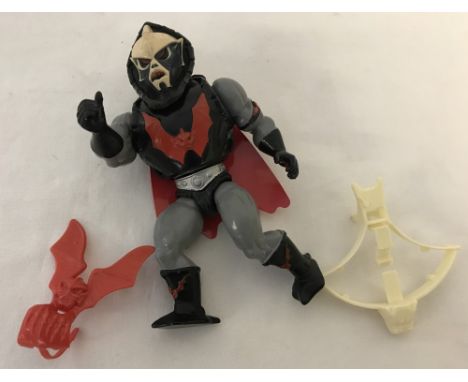 A vintage 1984 Mattel Masters of the Universe Hordak action figure. Complete with Body armour, red cape, bat and crossbow wea