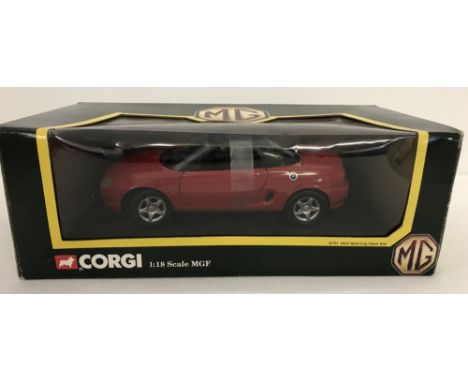 A boxed Corgi 1:18 scale MGF 1.8i VVC Roadster. Hard Top in flame red. 