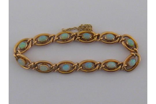 An Antique 15 Carat Gold Opal Bracelet Marked 15ct Opals Rox Auction Date