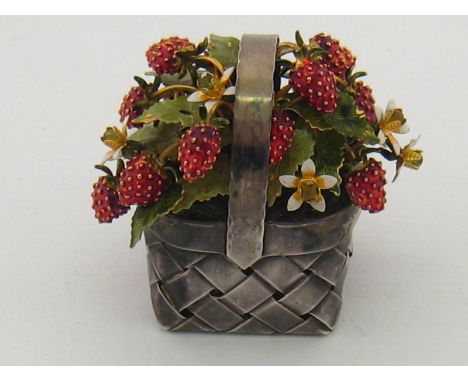 Cartier . A silver and enamel strawberry basket, signed Cartier and marked Hand Made Sterling, approx 9 x 6 x 8cm, approx 219