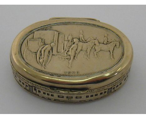 An oval white metal snuff box celebrating a railway 60th. jubilee , the side embossed with a steam train titled "Eisenbahnbal