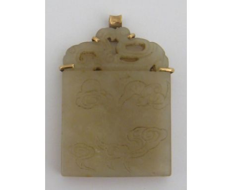 A yellow metal (tests gold) mounted Persian jade pendant, approx 5 x 3 cm. This lot is sold on behalf of Cancer Research.
