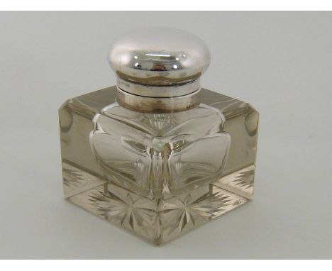 A large 800 standard silver mounted square glass inkwell with star cut base and drop in glass inner well. 10x10 x12cm. high. 