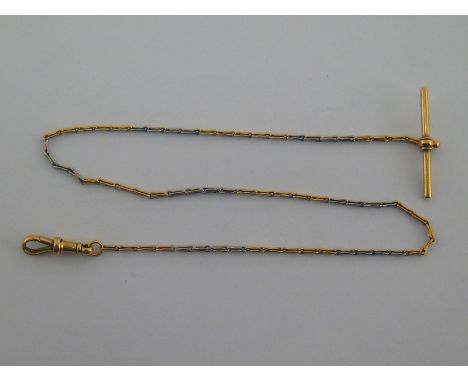 An 18 carat gold and platinum watch chain, marked 18ct, approx 35cm long, 9.7 gms.
