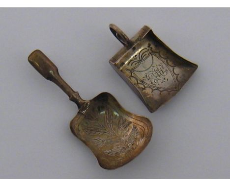 A Georgian silver scoop caddy spoon with scroll handle and engraved shield by Joseph Taylor, Birmingham, 1804., together with