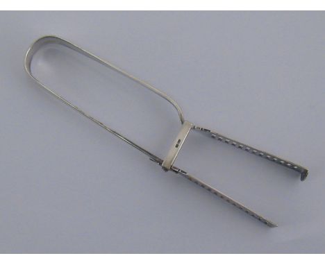 A pair of late Victorian silver chop tongs, George Howson, Sheffield 1899.length 13cm. wt. 138gm. 