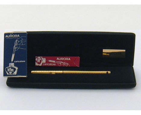 Aurora. An Aurora silver gilt fountain pen. The pen stamped 925 with Italian hallmarks on the cap and the barrel. The nib sta