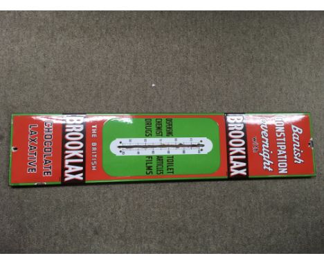 A rare vintage enamel sign for brook lax laxative advertising other chemist items multicoloured and with its original thermom