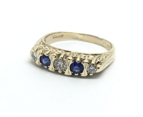 A 9ct gold sapphire and diamond ring, approx 2.9g and approx size M.