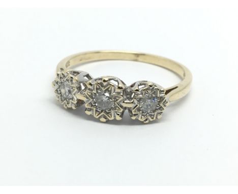 A 9ct gold three stone diamond ring, approx 2.4g and approx size R.