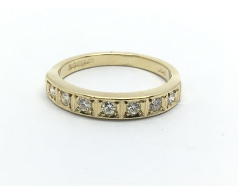 An 18ct gold seven stone diamond ring, approx.33ct, approx 3.6g and approx size M.