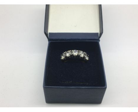 A silver five stone ring, approx size J - NO RESERVE