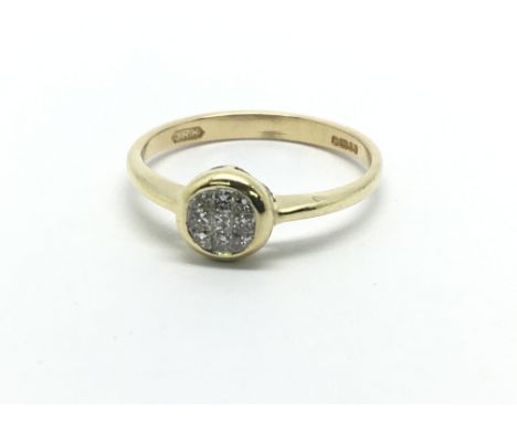 An 18ct gold diamond ring set with nine princess cut diamonds, approx.15ct, approx 1.9g and approx size K.