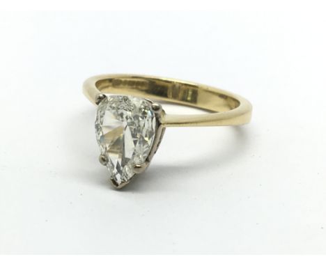 An 18ct gold ring set with pear shaped solitaire diamond, aporox 1.16ct, approx 3.8g and approx size N.