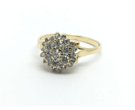 An 18ct gold diamond cluster ring approx 2.6g and approx size M-N.