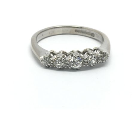 An 18ct white gold five stone diamond ring, approx .30ct, approx 3.2g and approx size L-M.