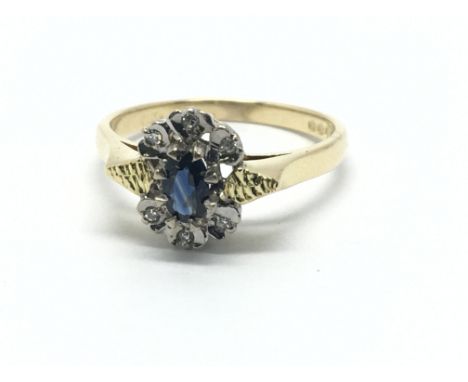 An 18ct gold sapphire and diamond ring, approx 3.8g and approx size M-N.