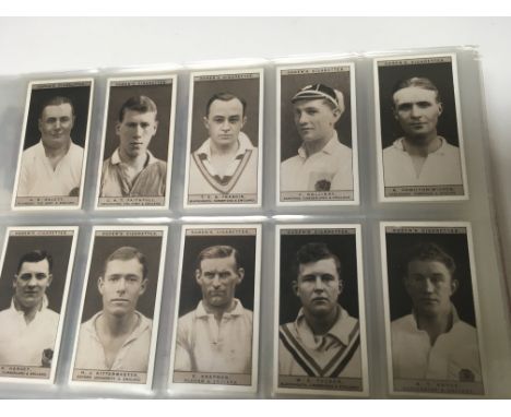 An album of cigarette card sets including Ogdens, Wills, John Sinclair, Lambert &amp; Butler, RJ Lea, U K Tobacco etc
