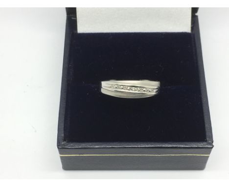 A 9ct white gold and diamond ring, approx 1.3g and approx size N.