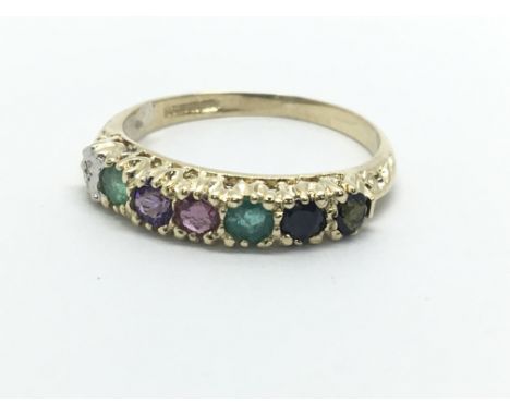 A 9ct gold 'regards' multi stone ring, approx 1.5g and approx size K-L.