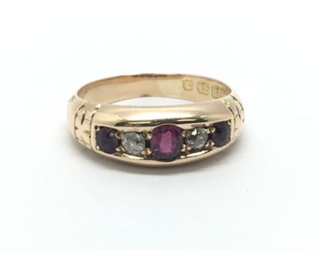 A vintage 18ct gold ruby and diamond ring, approx 3g and approx size M-N.