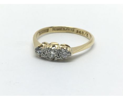 A 14ct gold and platinum three stone diamond ring, approx 2.1g and approx size K-L.