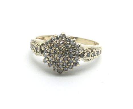 A 9ct gold diamond cluster ring, approx 3g and approx size O-P.