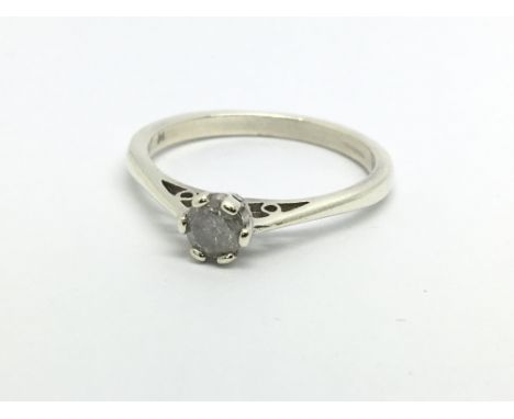 A white gold solitaire diamond ring, approx 1/4ct, approx 2.1g and approx size M.