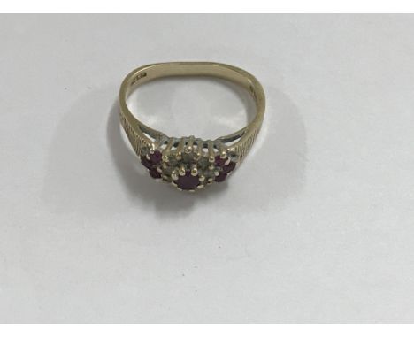 A 9 ct gold ring inset with garnets size L , 3 grams - NO RESERVE