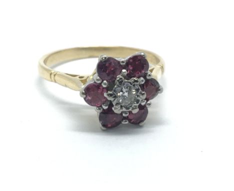 An 18ct yellow gold and ruby and diamond cluster ring, approx 3.8g, ring size approx O