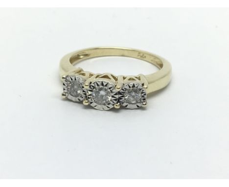 A 9ct gold three stone diamond ring, approx.25ct, approx 2.7g and aporox size L-M.