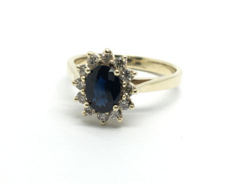 A 9ct gold sapphire and diamond cluster ring, approx 2.7g and approx size M-N.