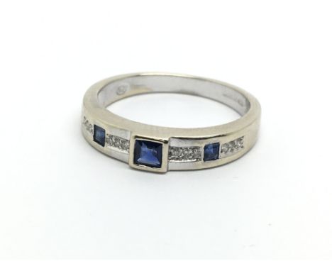 An 18ct white gold princess cut sapphire and diamond ring, approx 3.7g and approx size N-O.