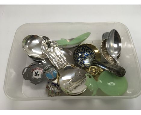 A collection of various tea caddy spoons.