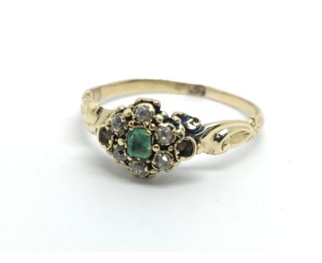 An unmarked gold emerald and diamond ring (stones missing), approx 2.4g and approx size Q.