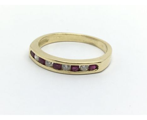 An 18ct gold half eternity ring set with alternating rubies and diamonds, approx 2.8g and approx size K-L.
