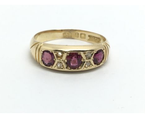 An 18ct gold ruby and diamond ring, approx 2.7g and approx size I.