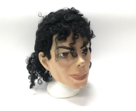 A rubber mask depicting Michael Jackson