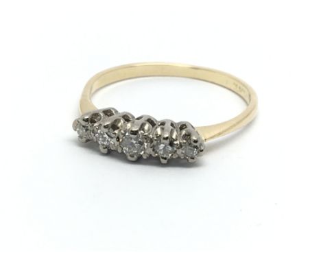 An 18ct gold and platinum five stone diamond ring, approx 2.3g and approx size O-P.