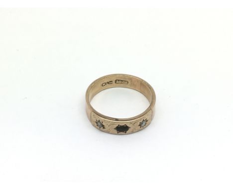 A 10ct gold ring set with small diamonds, one missing, approx 2.7g and approx size P.